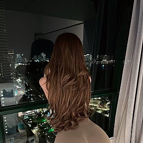 Angela Petite
 escort in Hong Kong offers French Kissing services